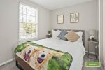 Third bedroom offers a queen-sized bed, perfect for couples -second floor-